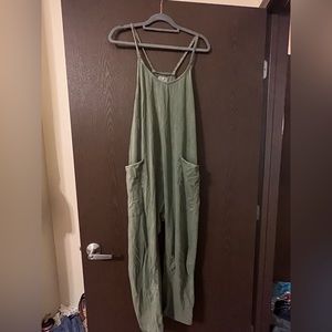 EUC free people hot shot romper (fits size L/XL)